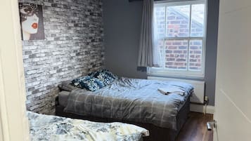 Apartamento | 4 quartos, Wi-Fi de cortesia, roupa de cama