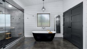 Cabin, 1 King Bed with Sofa bed, Hot Tub, Garden View (Whispering Retreat) | Bathroom | Deep-soaking bathtub, towels