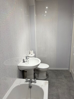 Apartment | Bathroom | Separate tub and shower, deep soaking tub, hair dryer, towels