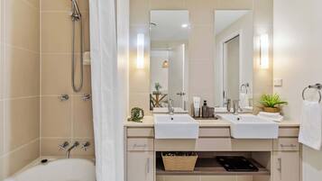 Shower, hair dryer, towels, shampoo