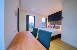 Quadruple Room | Minibar, in-room safe, desk, laptop workspace
