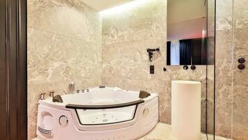 Shower, hair dryer, towels, shampoo