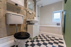Shower, hair dryer, towels, shampoo