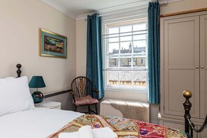 1 slaapkamer, een strijkplank/strijkijzer, wifi, beddengoed