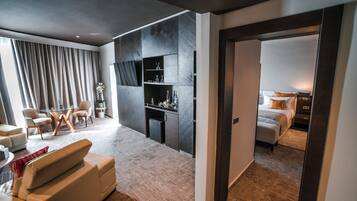 Presidential Suite | Living area | 40-inch TV with digital channels