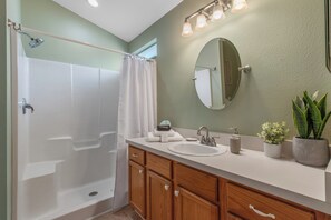 Shower, hair dryer, towels, soap