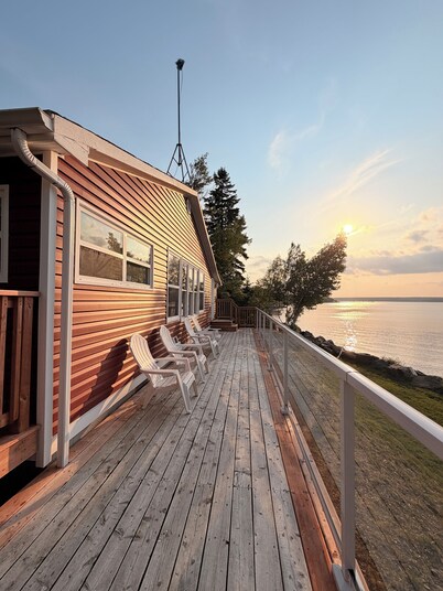 Beautiful two-bedroom waterfront cottage. Unbelievable Sunsets.