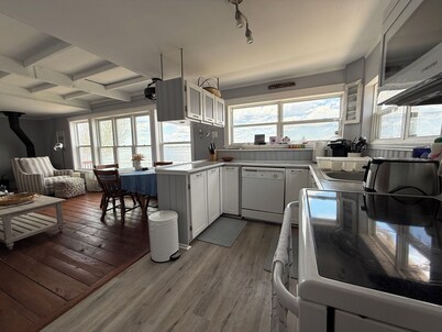 Beautiful two-bedroom waterfront cottage. Unbelievable Sunsets.