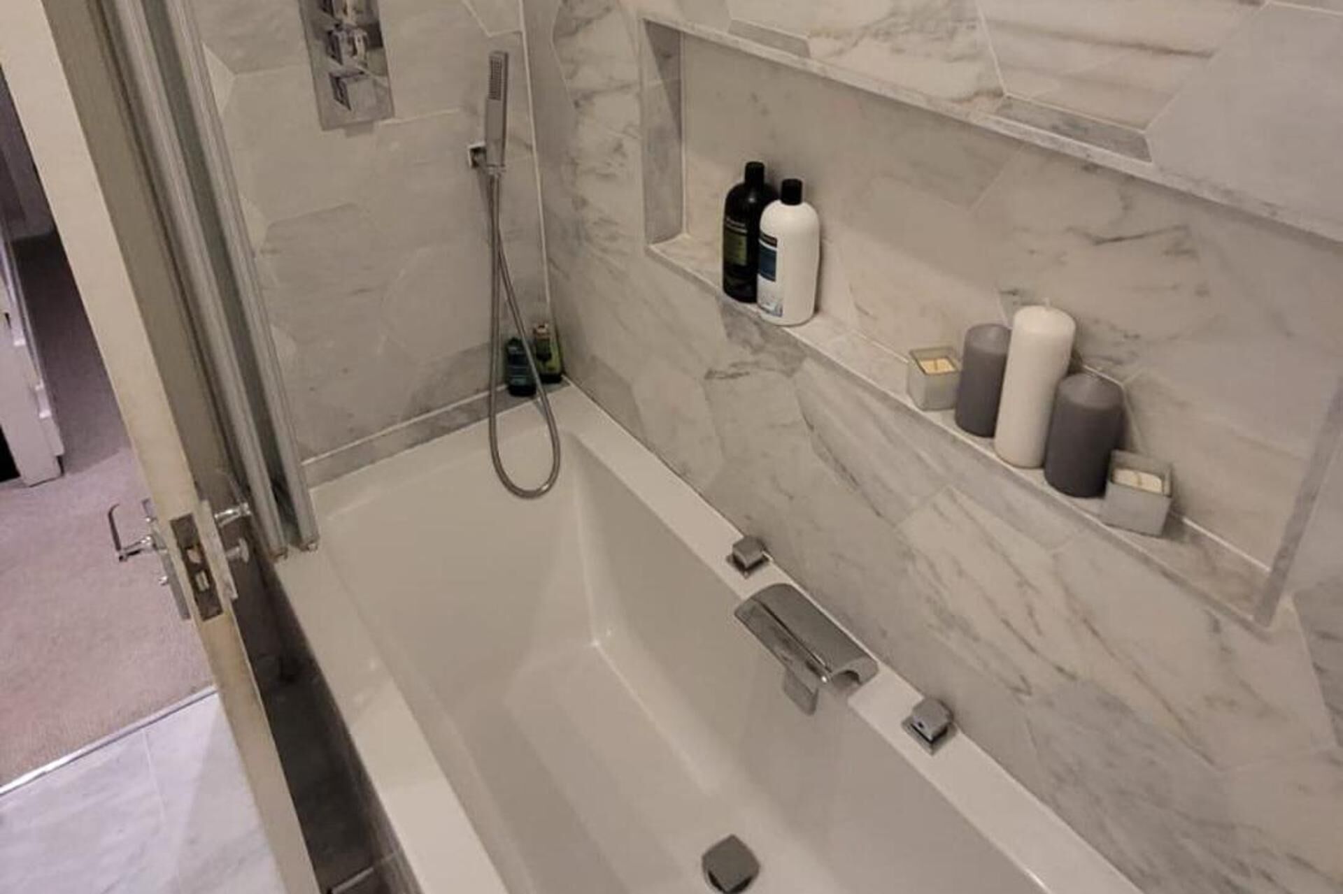 Combined shower/bathtub, deep-soaking bathtub, hair dryer, towels