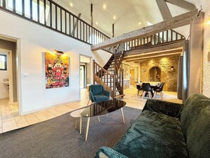 TV, fireplace, books