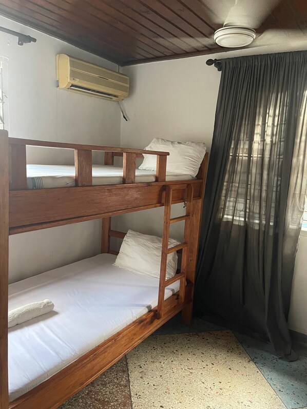 Comfort Double or Twin Room, Patio | Desk, laptop workspace, iron/ironing board - Milele hostel (Dar es Salaam)