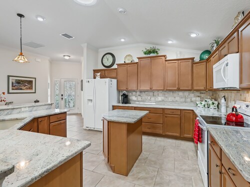 Relax & Unwind in This Charming 3/2 Courtyard Villa in Pine Ridge!