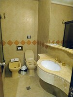 Family Room, City View | Bathroom | Hair dryer, towels, soap, shampoo
