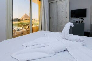 Deluxe Double Room, Balcony, Mountain View | Minibar, in-room safe, individually decorated, desk