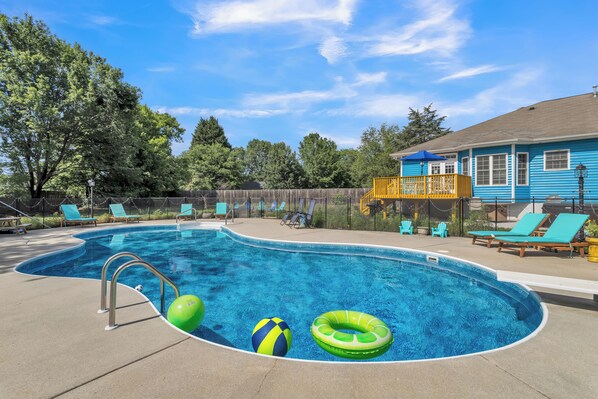 Outdoor pool, pool umbrellas, pool loungers