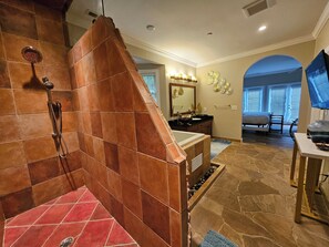 Separate bathtub and shower, hair dryer, towels, soap