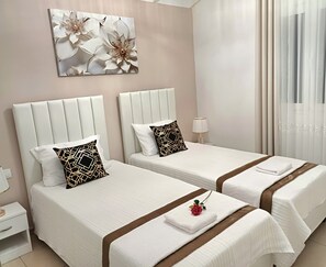 2 quartos, ferros/tábuas de passar roupa, Wi-Fi de cortesia