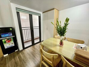 Loft Deluxe - balkong | Utsikt mot staden