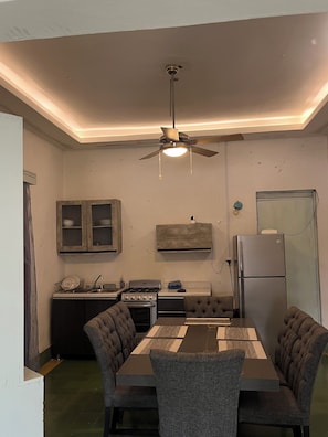 Junior Suite, 2 Bedrooms, City View | Shared kitchen | Fridge, microwave, oven, dishwasher