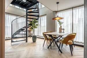 Apartment | Living area | 55-inch Smart TV with satellite channels