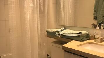 Hair dryer, towels, soap, toilet paper