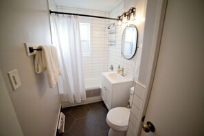 Hair dryer, towels, soap, toilet paper