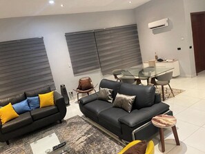 Deluxe Apartment, Balcony, City View | Living area