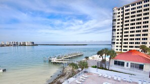 A hotel with a pool, beach, and pier. - Lovers Key Beach Club #303 (Fort Myers Beach)