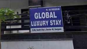 A sign for a GLOBAL LUXURY STAY located at Q-86, South City I, Sector 40, Gurgaon. - Global luxary stay  (Gurugram)
