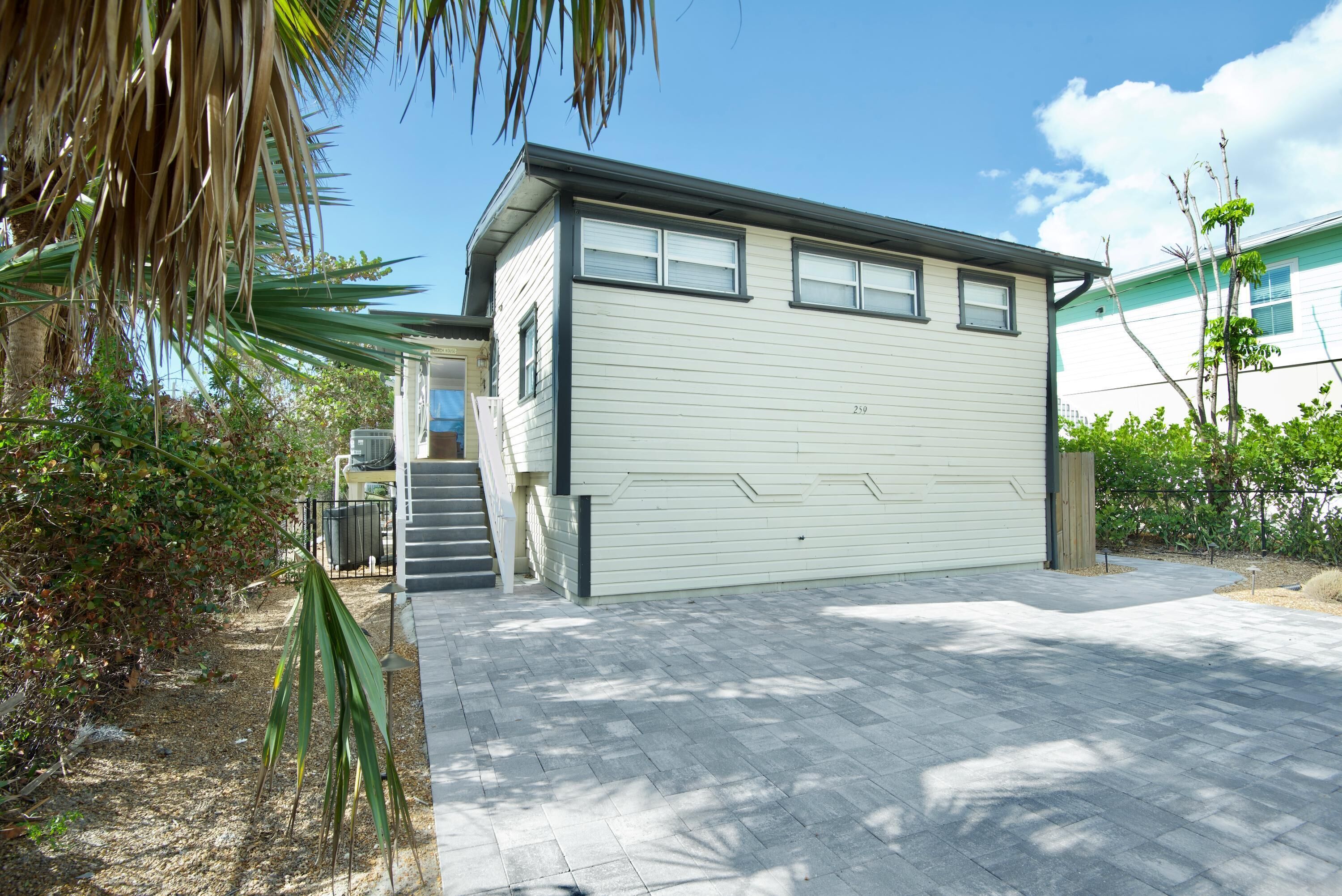 House, Multiple Beds (Tan Lines) | Exterior