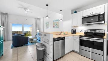 Condo, 1 King Bed with Sofa bed (Madeira Bay Resort I 1402) | Private kitchen | Oven, toaster