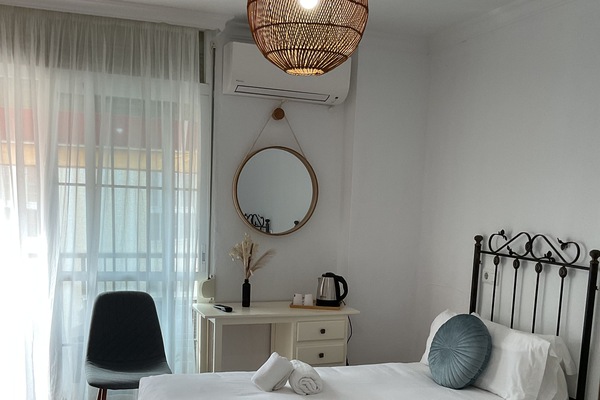 Basic Double Room, City View | Desk, WiFi (free), bed sheets
