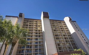 A multi-story hotel with a central tower and a symmetrical facade. - St. Pete Beach Yacht and Tennis Club 404 (St. Pete Beach)
