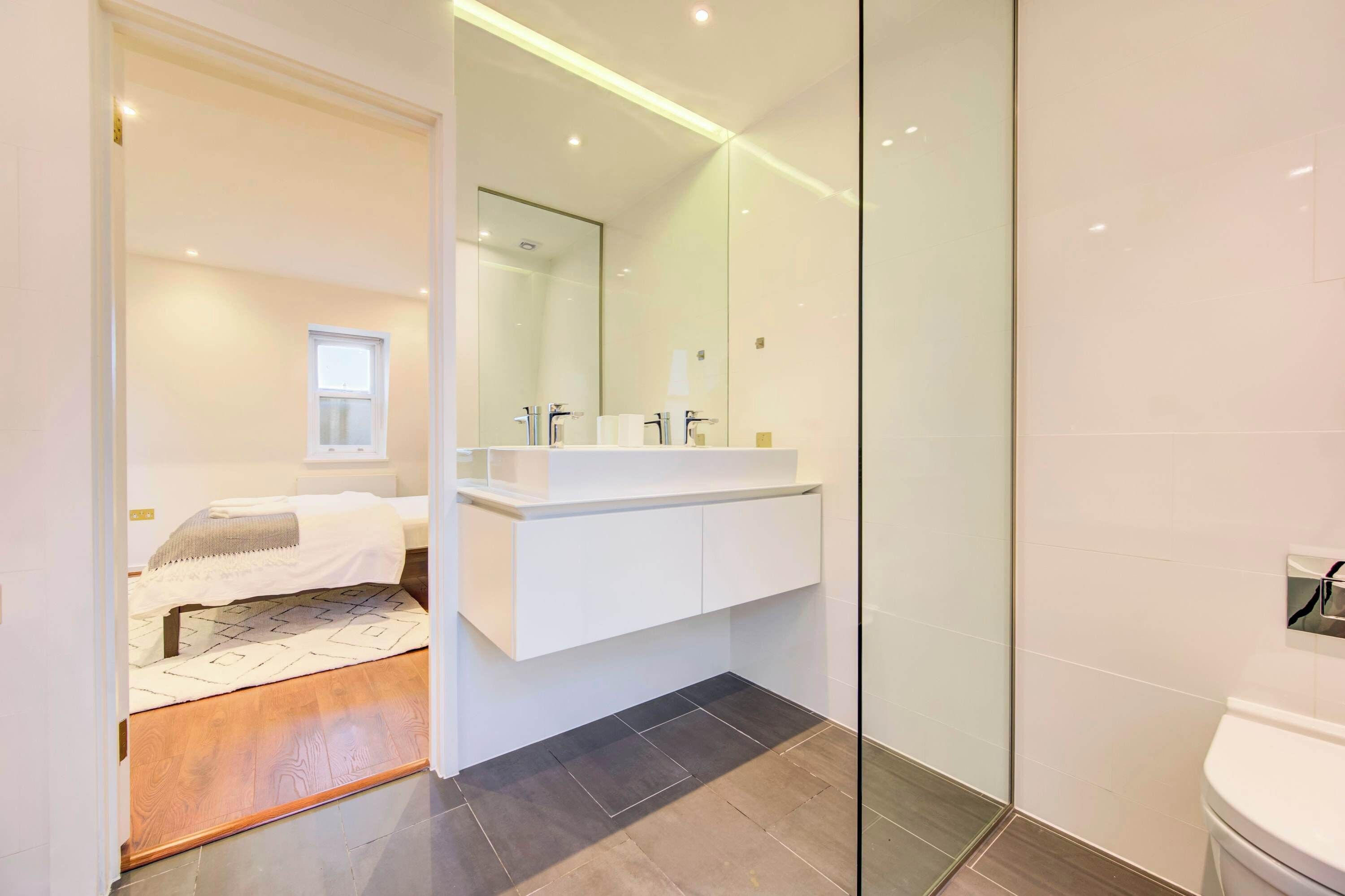 Shower, hair dryer, towels, shampoo
