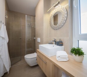 Shower, free toiletries, hair dryer, bathrobes