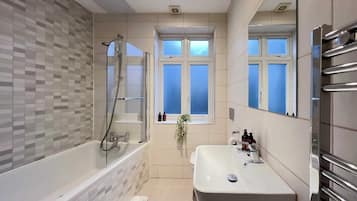 Shower, hair dryer, towels