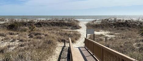 On the beach, sun-loungers, beach towels