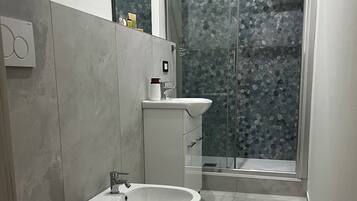 Double or Twin Room | Bathroom | Shower, hair dryer, bathrobes, towels