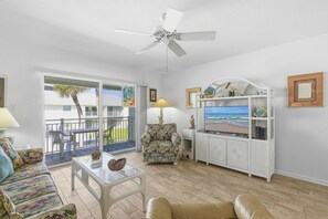 Condo, Multiple Beds (Colony Beach Club 220) | Living area | TV
