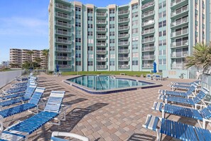 Condo, Multiple Beds (Coronado Towers 703) | Pool | A heated pool - Coronado Towers 703 (New Smyrna Beach)