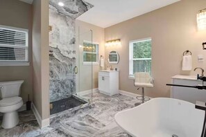 Shower, eco-friendly toiletries, hair dryer, towels