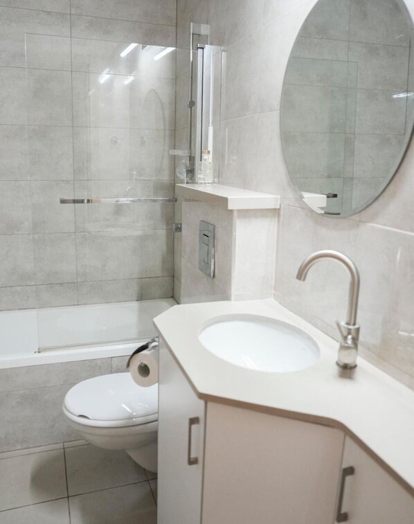 Hair dryer, towels, toilet paper