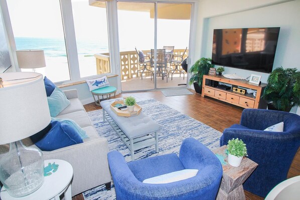 Condo, Multiple Beds (Golden Arms 805) | Living area | TV - Golden Arms 805 (New Smyrna Beach)