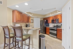 Condo, Multiple Beds (Oceanwalk 13-406) | Private kitchen | Oven, toaster