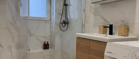 Hair dryer, towels, soap, toilet paper