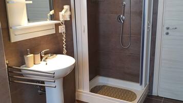 Family Quadruple Room, Balcony, Garden View | Bathroom | Shower, free toiletries, hair dryer, bidet