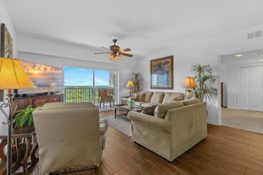 Condo, Multiple Beds (Oceanwalk 9-604) | Living area | TV - Oceanwalk 9-604 (New Smyrna Beach)