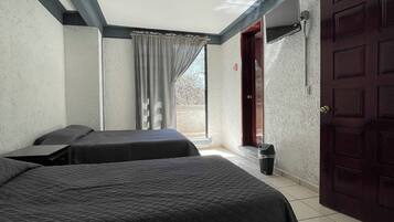 Habitación triple, vista al valle | Escritorio, espacio para trabajar con laptop y wifi gratis