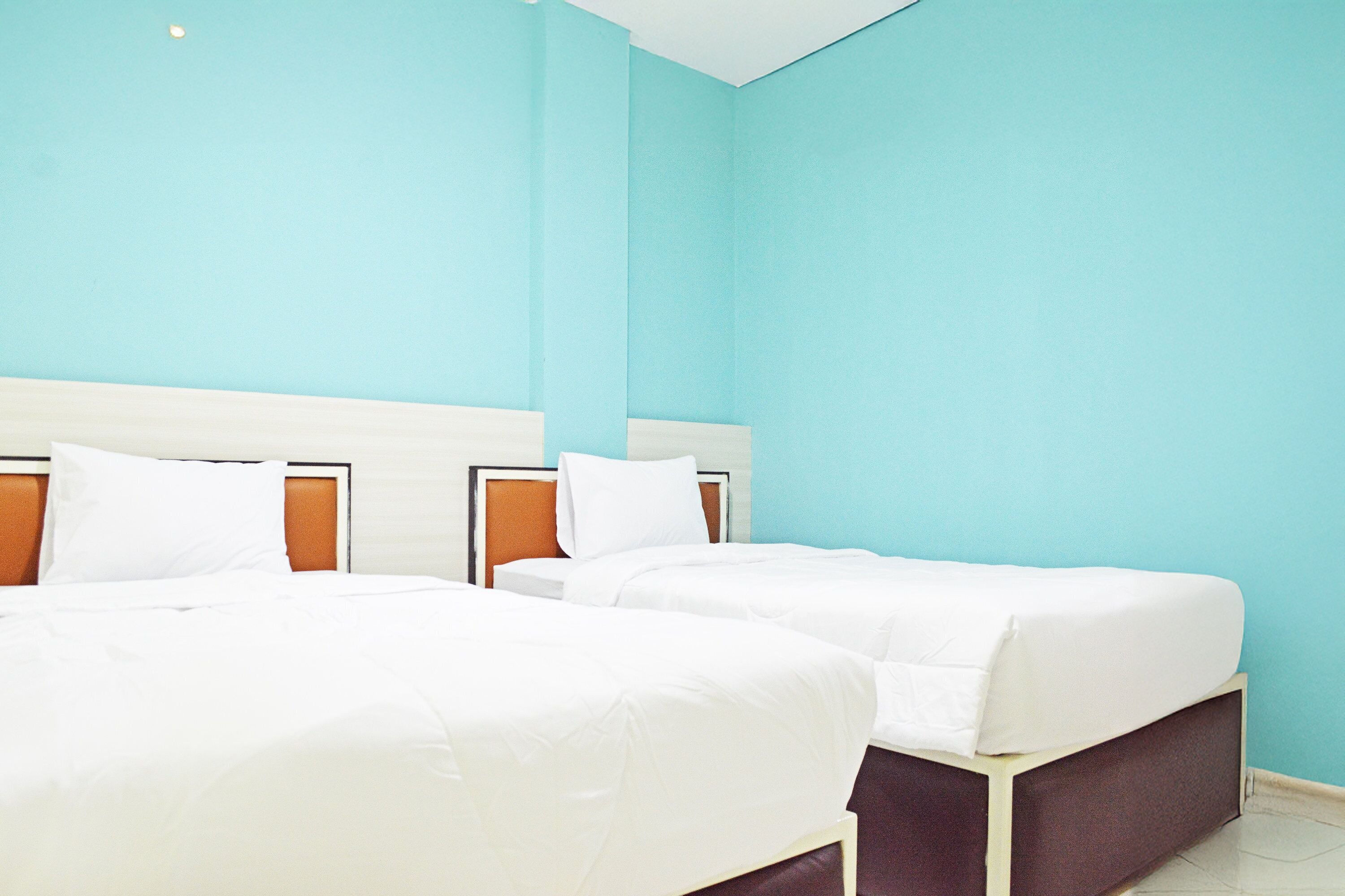 Habitación Deluxe con 2 camas individuales | Wifi gratis y ropa de cama 