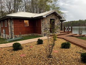 Property grounds - Cozy Cabin on Lake, relax and recharge. Enjoy boating, fishing and swimming. (LaFayette)